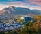 Fantastic cityscape of Salzburg with Hohensalzburg Fortress. Spectacular autumn sunrise on Eastern Alps. Picturesque morning lands