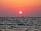 Fantastic crimson sea ocean sunset horizon sky photo