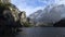 Fantastic Dolomites surrounding wooden fishing house on lake Braies, Italy