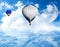 Fantastic dreams. Hot air balloons in blue sky with clouds and crescent moon over sea