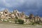 Fantastic fairy chimney rock formations with many christian cave churches at a valley near Goreme. Spring day in Cappadocia, Turke