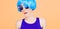 Fantastic fashion lady in blue wig and glasses