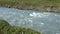 Fantastic landscape with flowing rivers and streams with rocks and grass in Iceland