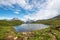 Fantastic landscape with lake in the Swiss Alps, Europe. Wetterhorn, Schreckhorn, Finsteraarhorn et