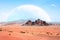 Fantastic landscape with sand desert, rock and planets in sky