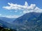 Fantastic mountain landscape. On a slope of the mountain lie at home and plantations of farms in the Southern Tyrol.