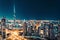 Fantastic nighttime Dubai skyline with illuminated skyscrapers