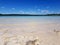 Fantastic panorama of crystal clear lake Donzo in the Leningrad region of Russia on a Sunny cloudless summer day