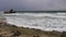 Fantastic Rocky coast. Sea waves impact rocky on the beach