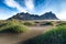 Fantastic sunny day and gorgeous black sand dunes on Stokksnes cape in Iceland