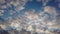 Fantastic timelapse of altocumulus clouds, wonderful natural lights effects and colors with  slowly and scenic moviment