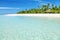 Fantastic turquoise beach with palm trees and white sand