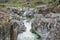 Fantastic view of a mountain river carving ist way through a wild rocky gorge