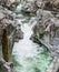 Fantastic view of a mountain river carving ist way through a wild rocky gorge in a wild mountain valley