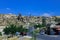 Fantastic View to the GÃ¶reme with rock houses in front of the spectacularly coloured valleys nearby,