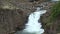 Fantastic waterfall in the stunning landscape of Iceland