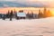 Fantastic winter landscape with wooden house in snowy mountains