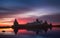 Fantastically beautiful pink sunset on on the Holy Lake with a view of the Solovetsky Spaso-Preobrazhensky Monastery.Russia.