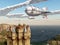 Fantasy airship over a scottish castle