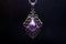 fantasy amethyst necklace pendant and silver chain - black background - intricate details