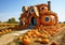 Fantasy cartoon pumpkin-shaped house in a pumpkin field in forest