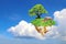 Fantasy floating island with green grass, tree, wild animals