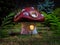 Fantasy fly-agaric house in woodland