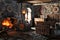 Fantasy interior of a medieval bedroom with traditional decorations and a cozy fireplace .