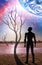 Fantasy landscape of the future - Person silhouette standing on barren land with bare trees and huge planet rising, galaxy in the