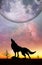 Fantasy landscape - Howling wolf and bare tree silhouettes with huge planet rising behind and galaxy in the sky