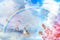 Fantasy world. Beautiful rainbow in sky with clouds over enchanted castle