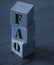 FAQ abbreviation made of wooden cubes on an office table. Business concept