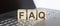 FAQ abbreviation stands for written on wooden cube on laptop