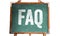 FAQ, acronym for â€œFrequently Asked Questionsâ€ white text written on a green old grungy vintage wooden chalkboard or blackboard