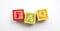 FAQ word made from colourful wooden baby development blocks
