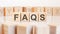 faqs word made with building blocks, concept.