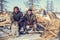 Far north of Yamal, tundra, pasture nord reindeers, family of reindeer herders of the north, father with two sons and a dog