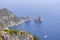 Faraglioni, attractive coastal rock formation eroded by waves, Capri, Italy