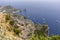 Faraglioni, attractive coastal rock formation eroded by waves, located off the coast of the island of Capri in the Gulf of Naples