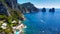 Faraglioni from Marina Piccola Beach in Capri, Italy. Aerial view from drone