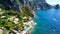 Faraglioni from Marina Piccola Beach in Capri, Italy. Aerial view from drone