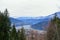 A faraway view looking down on the town of Nelson during the winter with lake Kootenay in the background, in British Columbia