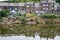 Farciennes, Wallon Region, Belgium, Residencial houses reflecting at the banks of the River Sambre