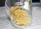 Farfalle macaroni in a glass container on the table