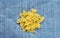 Farfalle macaroni A handful of macaroni on a rustic blue textured background. A view from the top, a close-up of a