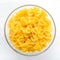 Farfalle macaroni pasta in glass bowl on white isolated background in the center close-up with top.
