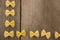 Farfalle pasta arranged in a row