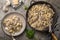 Farfalle pasta with champignon mushrooms and garlic creamy sauce on pan