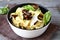 Farfalle pasta with mushrooms and cheese