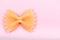 Farfalle tie bow shaped pasta macro